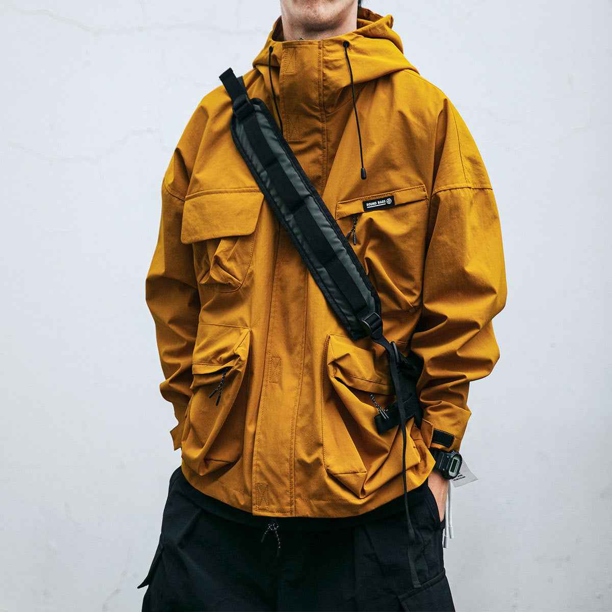 Hooded Windproof Jacket Men's Loose Three-dimensional Pocket Casual Clothing